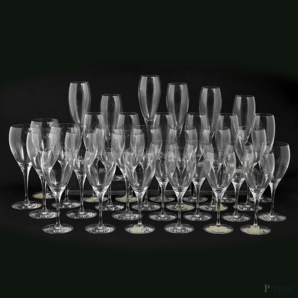 Servizio Christofle composto da ventuno bicchieri da vino e undici flutes, XX secolo, altezza massima cm 22, ( segni di usura)