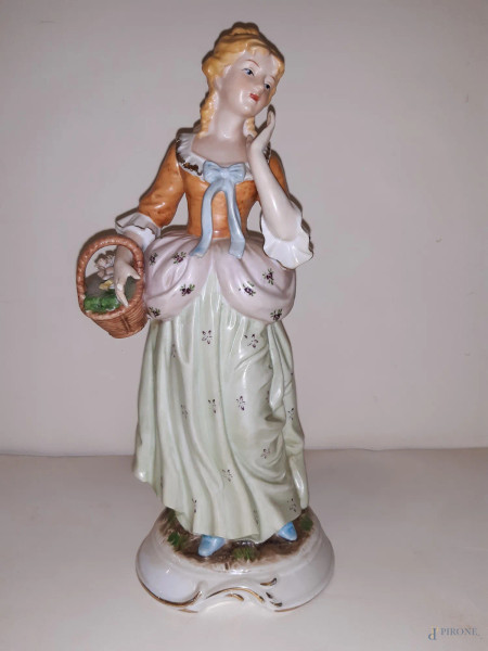 fanciulla con cesta in porcellana, H 33 cm.