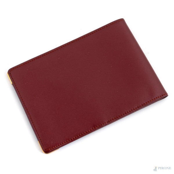 Portassegni Must de Cartier in pelle bordeaux, misure massime cm 26,5