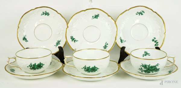 Lotto composto da tre tazze da thè e sei piattini in porcellana Rosenthal, decori floreali in verde, finiture dorate, XX secolo, (lievi sbeccature)