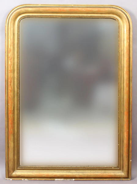 Specchiera francese del XIX sec. In legno dorato ed inciso, altezza 121x85 cm.
