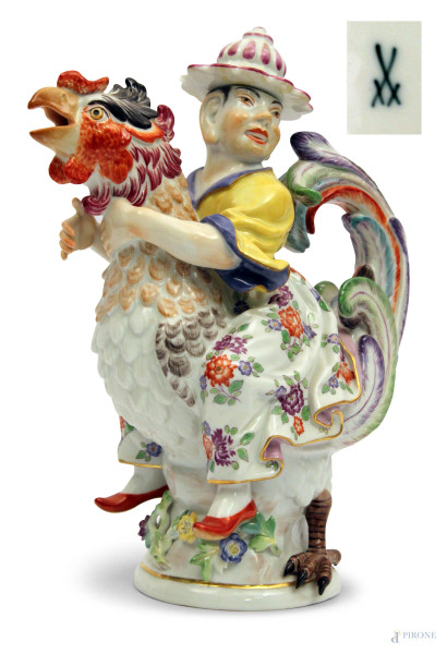 Teiera in porcellana policroma a forma di figura orientale cavalcante gallo, marcato Meissen, (lievi sbeccature sul cappello), h. cm 22.