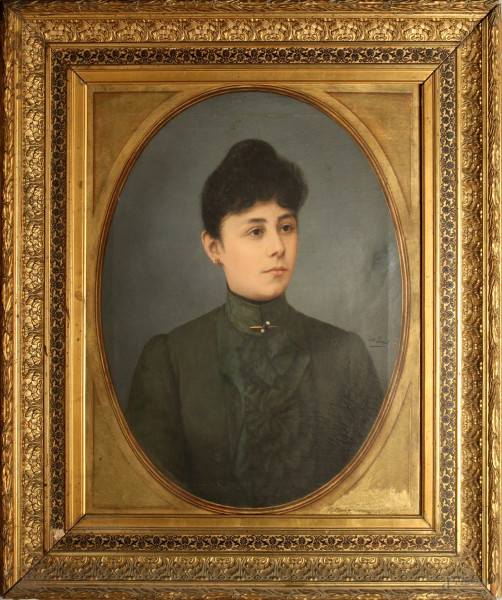 Ritratto di donna, olio su tela ad assetto ovale, cm 75x60, firmato, entro cornice.