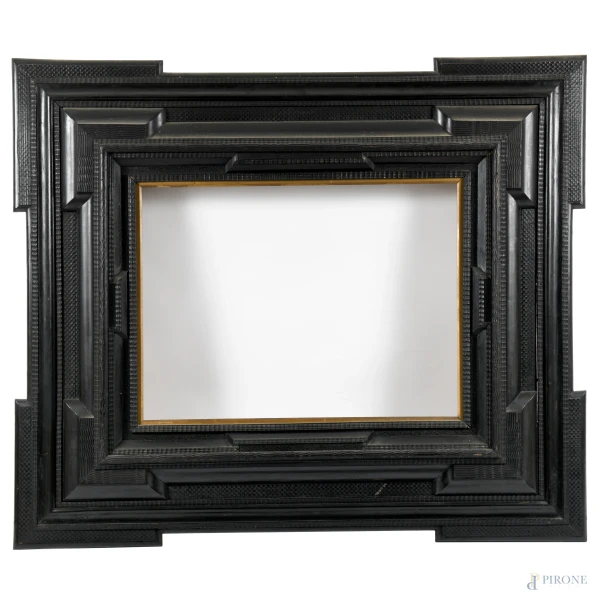 Cornice guillochè in legno intagliato ed ebanizzato, XIX secolo , battuta cm 117x136, lue cm 55x74