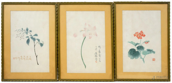 Artista orientale del XX secolo, Fiori, tre acquarelli su carta, cm 29x18, entro cornici, (macchie sulla carta)