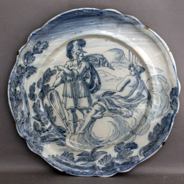 Piatto in maiolica blu raffigurante scena mitologica, XIX sec., diametro 37 cm.