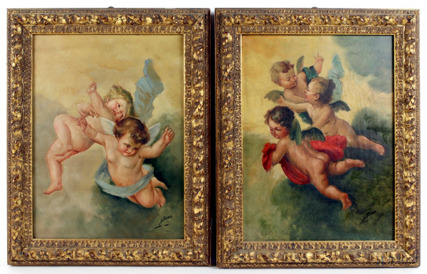 Coppia di dipinti raffiguranti putti, olio su tela, cm. 40x30, firmati, entro cornice.