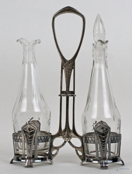 Oliera in peltro con due flaconi in vetro (mancante un tappo), altezza cm 25, XX secolo