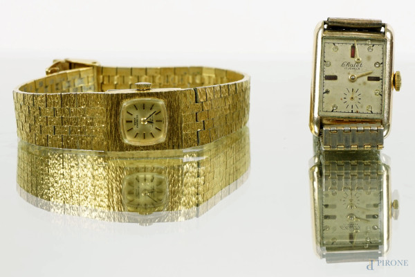 Lotto composto da 2 orologi Swiss Empress e Chalet con casse in metallo dorato, (meccanismi da revisionare)