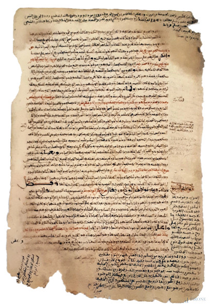 Antico manoscritto persiano in caratteri arabi vergati a inchiostro bruno e lacca rossa
