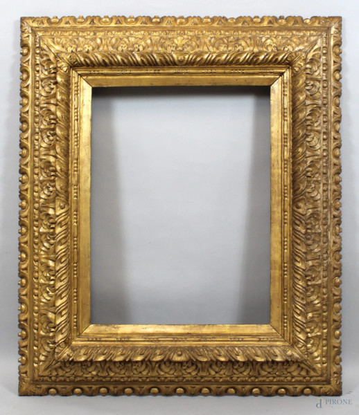 Cornice del XIX secolo, in legno intagliato e dorato, misure ingombro 106x88, specchio 66,5x49 cm.