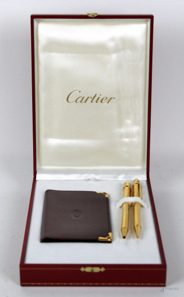 Cartier, set composto una penna a sfera, un portamina ed un portacarte di credito, con certificato di garanzia, entro custodia originale