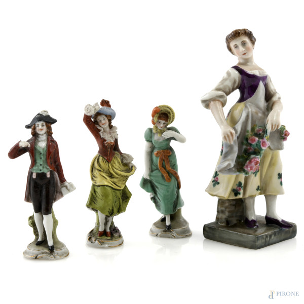 Lotto di quattro sculturine in porcellana di varia manifattura, XX secolo, altezza cm 12,5, (segni di usura, difetti)