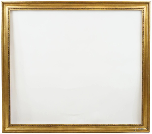 Cornice in legno intagliato e dorato, XX secolo, misure ingombro cm 134x116, misure luce cm 104x121,5