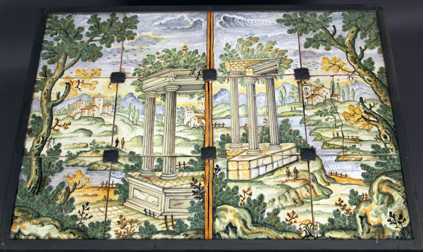 Tavolinetto da salotto in ferro battuto con piano composto da dodici mattonelle Castelli raffiguranti paesaggio con rovine, XVIII sec., cm 42x60x80, (difetti su tre mattonelle).