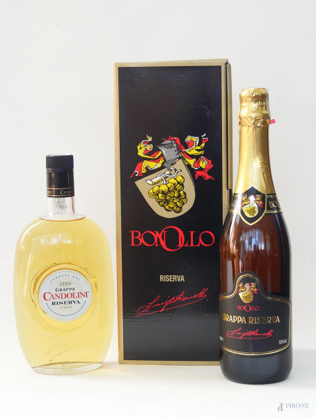 Due bottiglie di Grappa, Bonollo Gran Riserva con scatola e Candolini Riserva