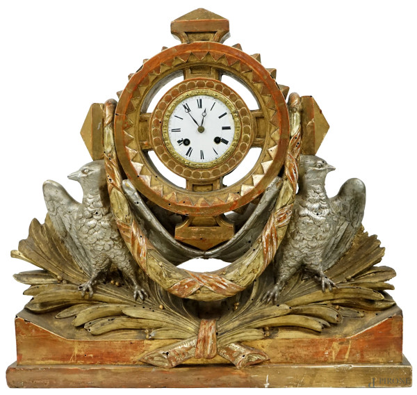 Orologio da appoggio in legno scolpito, dorato e argentato, XIX secolo, cm h 45x47x7, (difetti, meccanismo da revisionare).