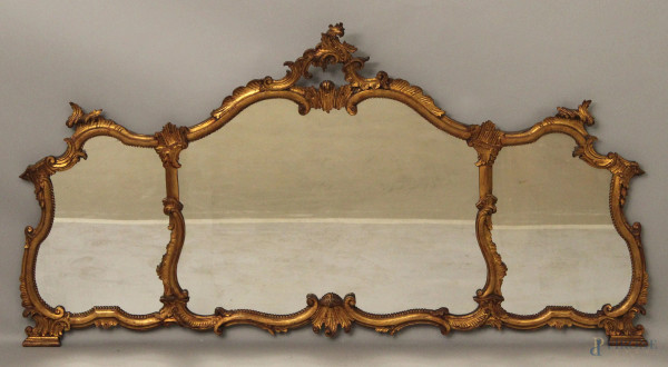 Coppia di specchiere di linea centinata in legno intagliato e dorato, primi 900, 162x85 cm