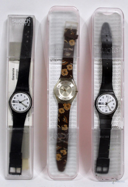 Lotto composto da tre orologi Swatch da collezione completi di astucci.