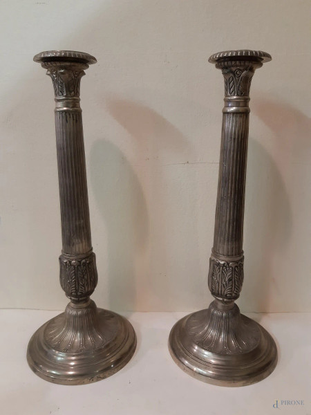 Coppia candelabri in metallo argentato, h 33,5 cm.