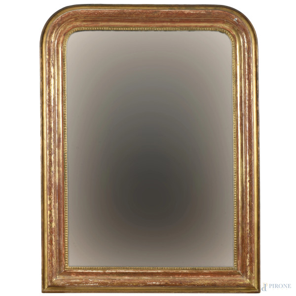 Specchiera in legno intagliato e dorato, XX secolo, cm 100x74, (segni di usura, scalfiture, cadute di doratura, difetti)
