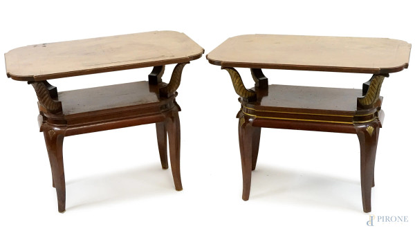 Due tavolini in legno impiallacciato, XX secolo, piani di linea sagomata, gambe mosse, cm h 60x75x49,5, (difetti)