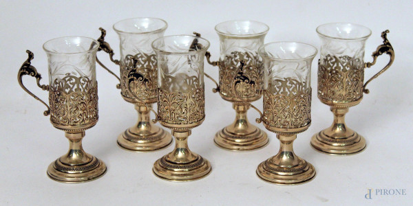 Servizio di bicchieri per sei in vetro e rivestiti in argento, completo di piattini.