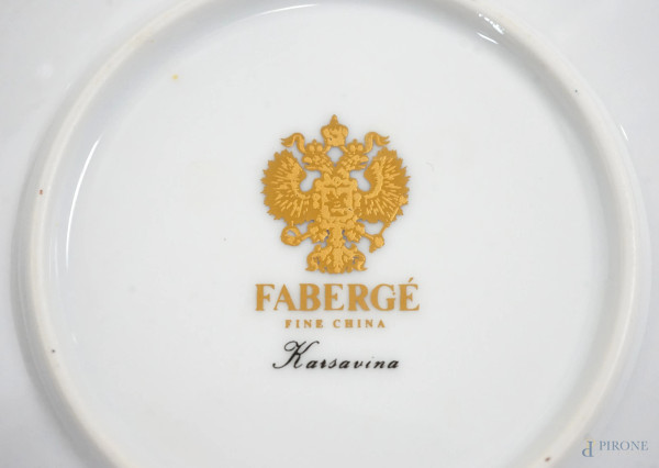 Lotto composto da varie tazze, tazzine e piattini in porcellana policroma di diverse manifatture,...