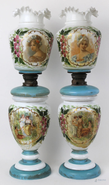Coppia di lampade in opaline con decori policromi a fiori e figure femminili, cm h 42, (difetti).
