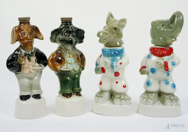 Quattro bottiglie in porcellana policroma a forma di animali, cm h 31, XX secolo, (difetti).