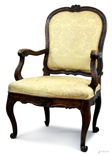Poltrona in noce, XIX secolo, seduta e schienale rivestiti in stoffa color crema, (segni del tempo).