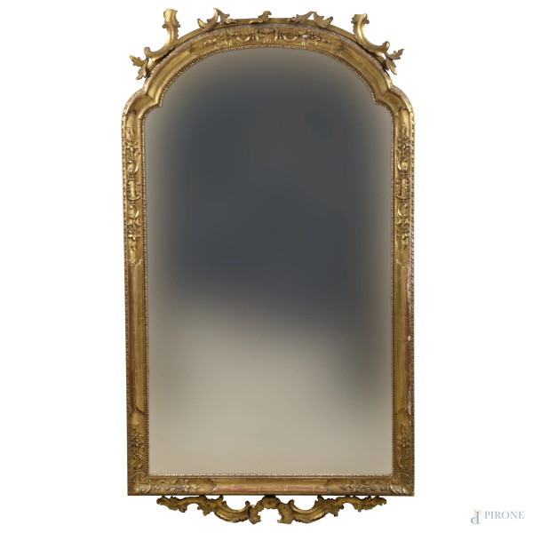 Specchiera in legno intagliato e dorato, XX secolo, cm 161x88, (segni di usura, scalfiture, difetti, rotture, mancanze)