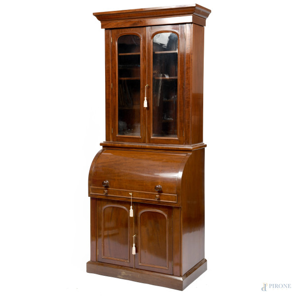 Bookcase in mogano, XX secolo, cm 224,5x91,5x54, (segni di usura, scalfiture, difetti)