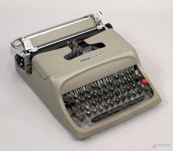 Olivetti, macchina da scrivere vintage, modello Studio 44, cm 13x37x32, segni di utilizzo, (meccanismo da revisionare).