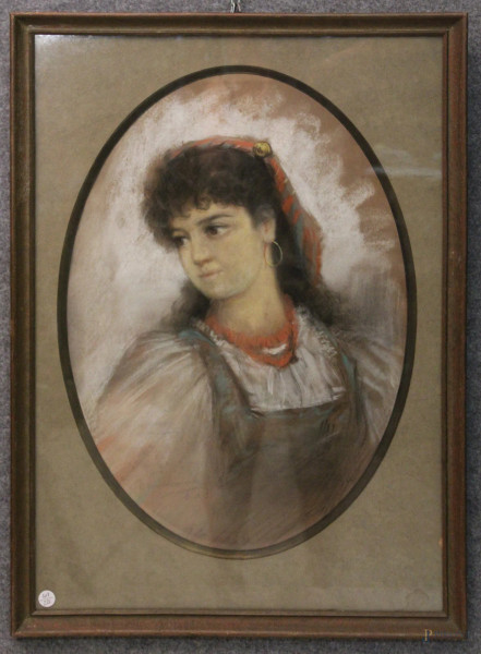 Ritratto di donna, disegno a pastello su carta ad assetto ovale  56x40 cm, entro cornice.