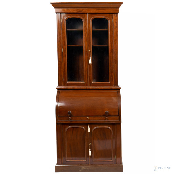 Bookcase in mogano, XX secolo, cm 224,5x91,5x54, (segni di usura, scalfiture, difetti)