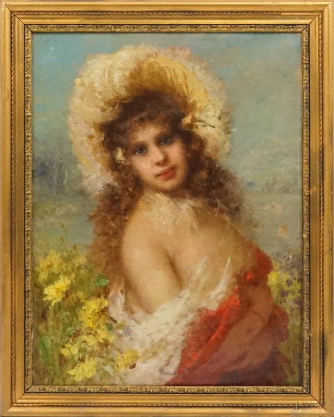Ritratto di ragazza con cappello, olio su tela, cm 65x49, firmato, entro cornice.