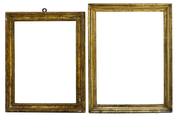 Lotto di due cornici in legno dorato del XX secolo, misure specchio cm 60x44, misure ingombro cm 53,5x40,5, (difetti).