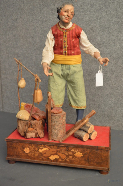 Figura da presepe in terracotta, poggiante su base, h. 46 cm.