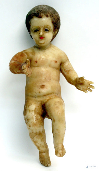 Bambinello in cera, XIX sec., H. 20 cm., (difetti).