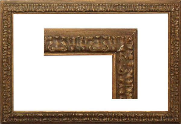 Cornice del XIX secolo in legno e pastiglia, dorata a mecca, misure specchio 67,5x102,5 cm, ingombro 82,5x117cm.