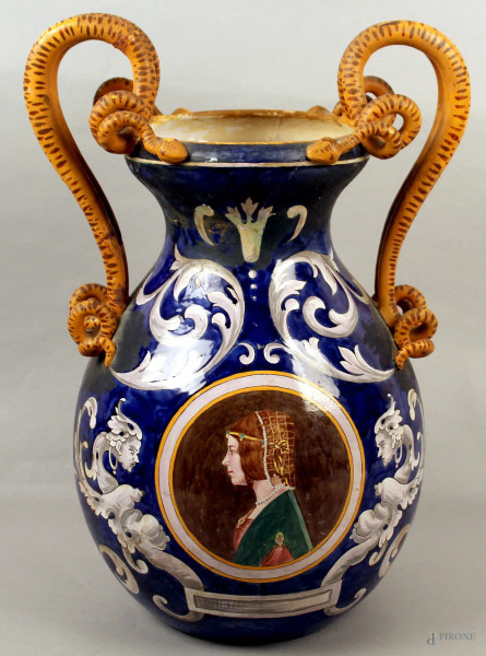 Vaso in maiolica smaltata a decoro di festoni con medaglione centrale a soggetto di figura, manici a forma di serpente, marcato, H 50 cm, (restauri).