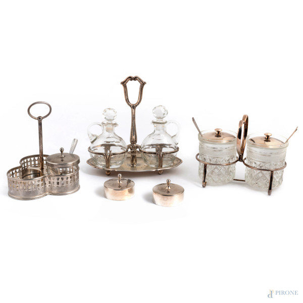 Lotto composto da tre set da tavola in metallo argentato, argento e vetro, misure massime cm , 20x21x15, peso argento gr 180, (set incompleti, segni di usura, difetti)