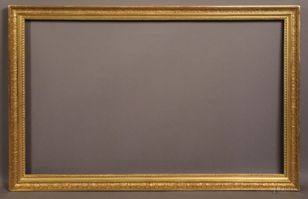 Cornice di linea rettangolare in legno dorato, primi &#39;900, cm 58x97.