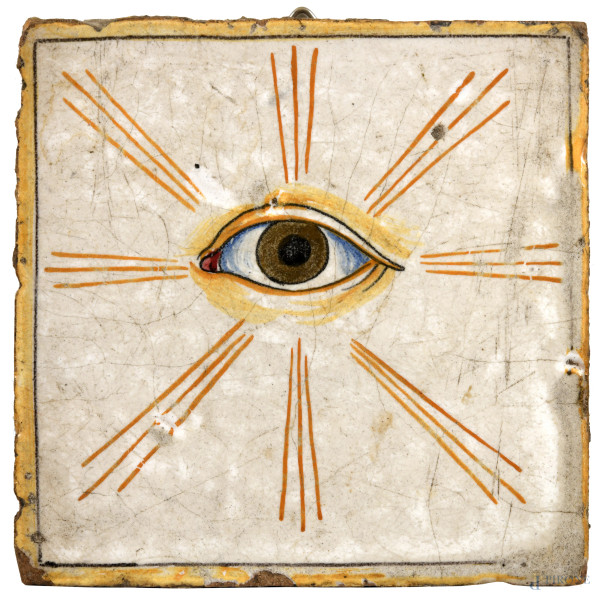 Mattonella decorata in policromia con Occhio di Dio, XX secolo, cm 13x13, (segni di usura, scalfiture, difetti)