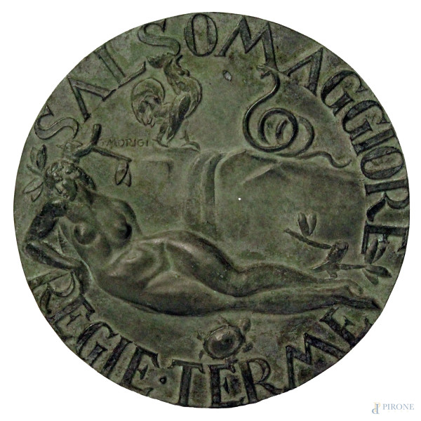 Salsomaggiore, medaglione in bronzo con nudo sdraiato a rilievo, firmato G.Morigi.