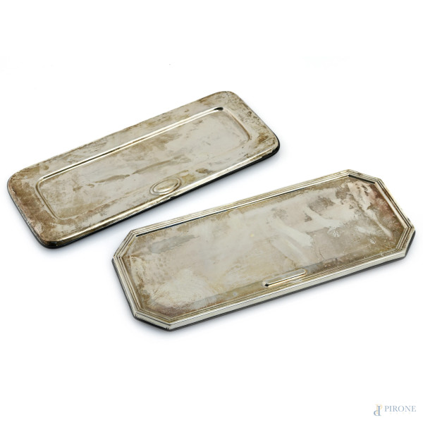 Lotto di due vassoietti portapenne rivestiti in lamina di argento, XX secolo, misura massima cm 24x10
