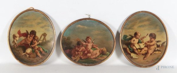 Lotto di tre dipinti ad olio su cartone a serto ovale, XIX-XX secolo, cm 36x30, entro cornice, (segni di usura, abrasioni, rotture, fessurazioni)