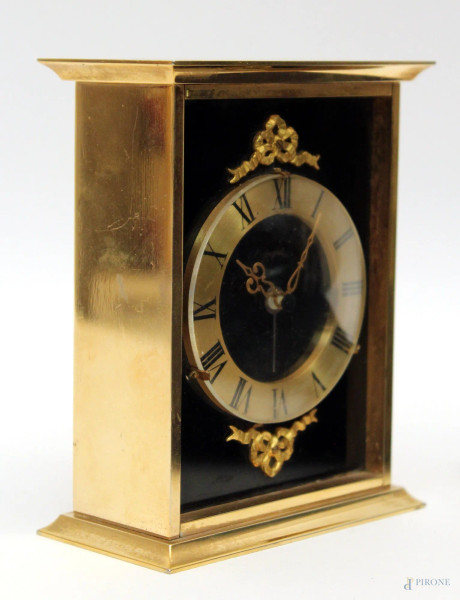 Orologio da tavolo in metallo dorato, h. 13 cm.