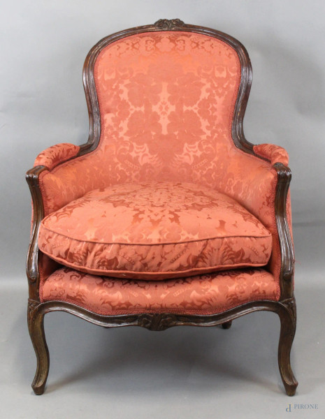 Poltrona Luigi XV, in noce, gambe arcuate, seduta e schienale imbottita e rivestiti in stoffa fiorata color rosa, altezza cm. 94